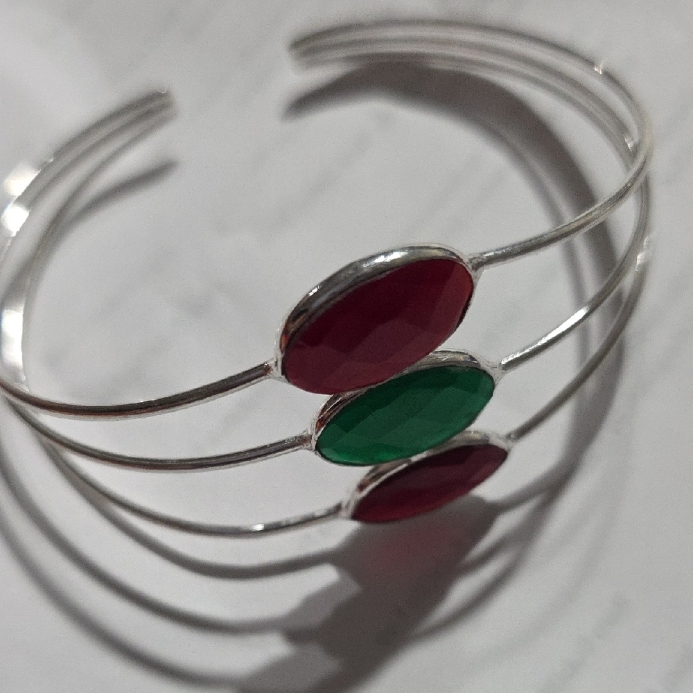 Elegant Silver Bracelet with Red and Green Accents